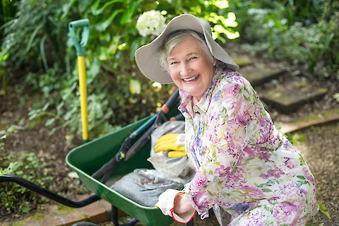 https://www.seniorhelpers.com/site/assets/files/441624/senior_woman_with_gardening_tools.480x0.webp