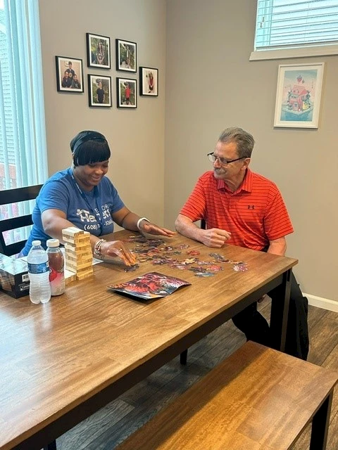 Client and Caregiver Puzzle Time
