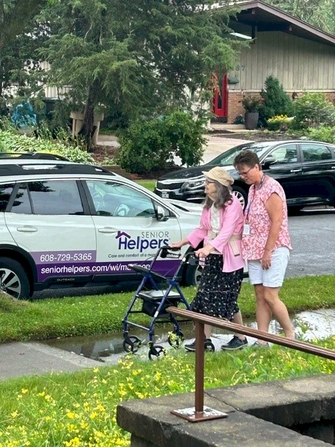 Client and caregiver going for a walk