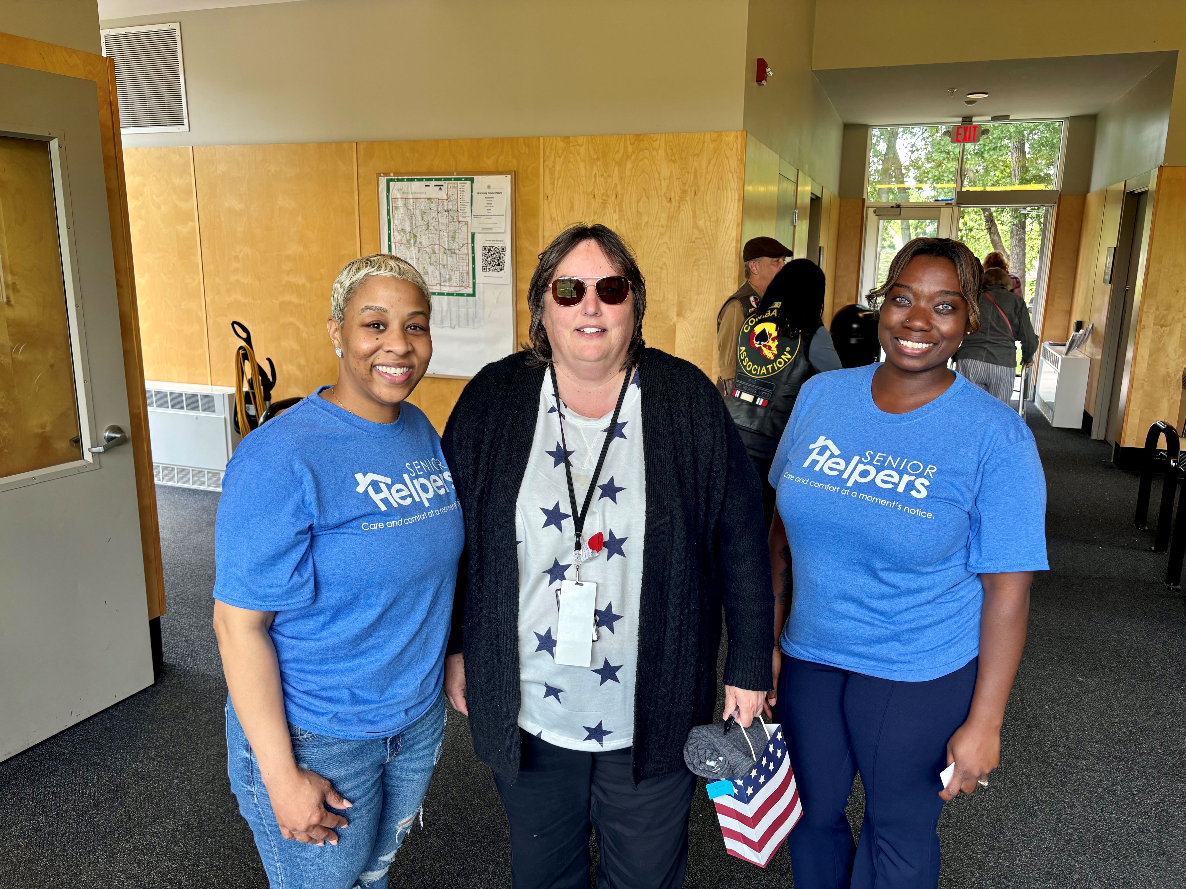 La and Antonia posing with one of our guests at our Veterans Appreciation Month event—it was a wonderful celebration!