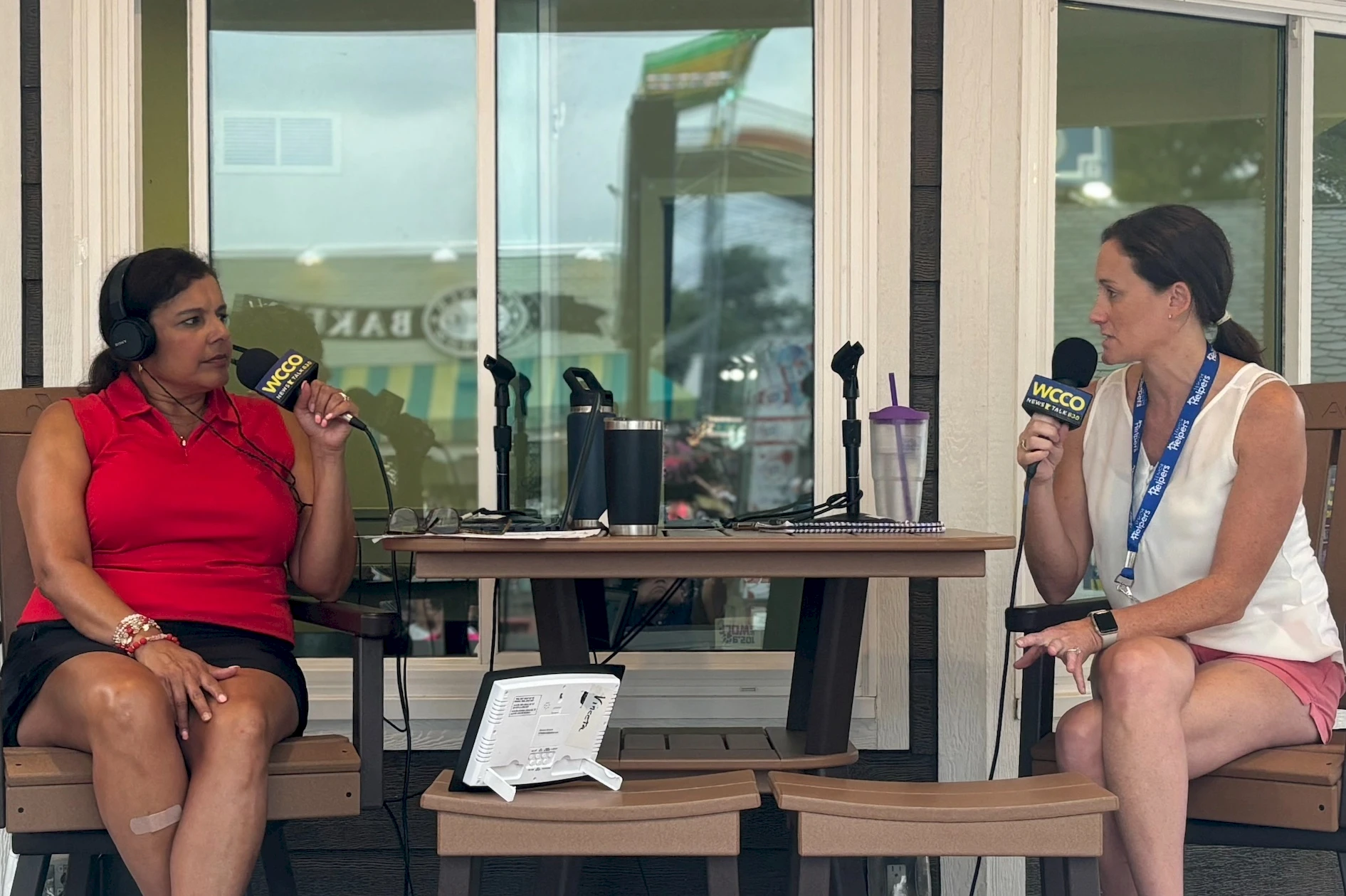 Senior Helpers owner, Kaitlin McDaniel does live on-air radio interview at Minnesota State Fair with WCCO morning show host Vineeta Sawkar.