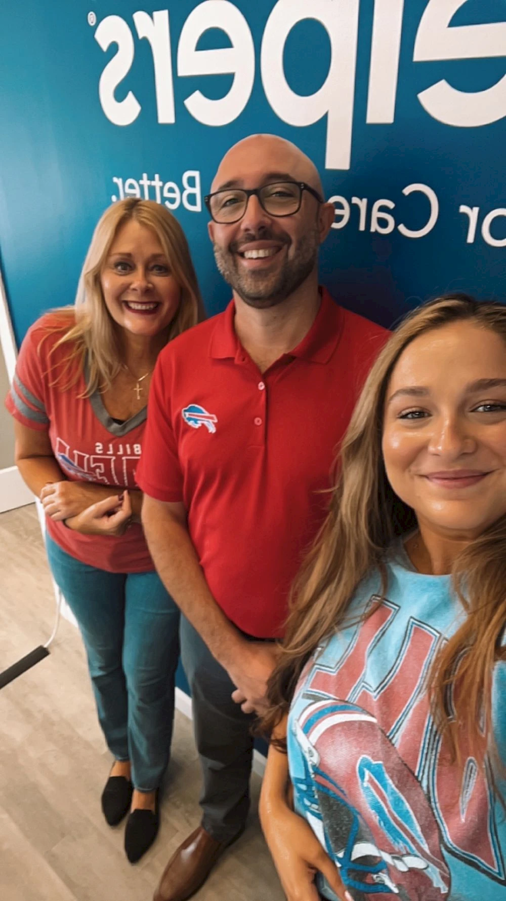 The office staff wearing our Buffalo Bills gear to support them in their home opener!