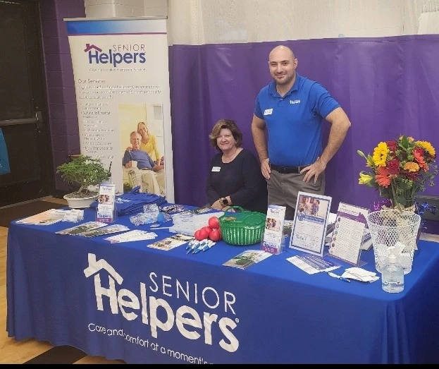 “Denise and Josh at the Rochester OPC event where there were vendors that provided information on all facets of senior services from home care, healthcare, financial services, housing and much more. “